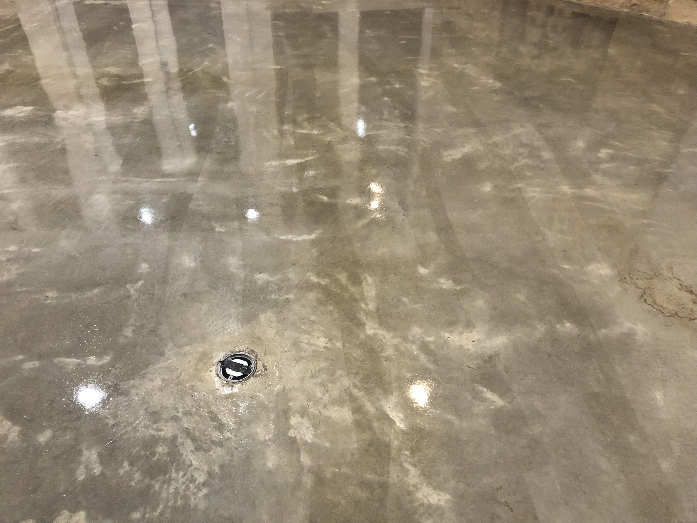 Close view of a smooth gray PetraSmooth floor with subtle tonal movement