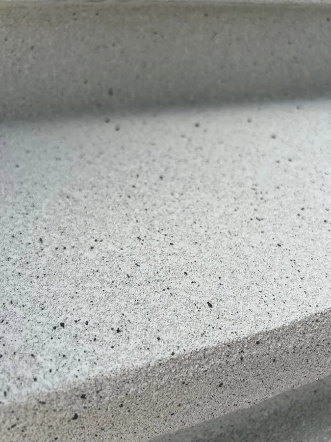 Finished PetraStone overlay on a staircase with rounded tread edges